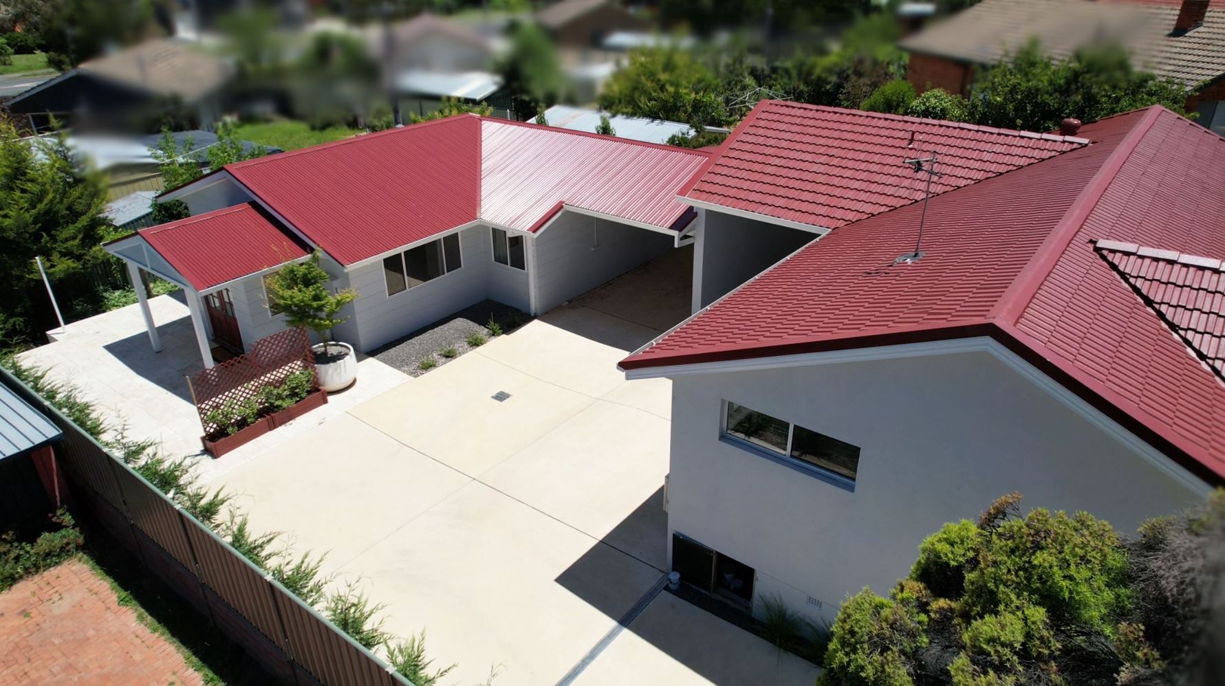 Rear dwelling and carports